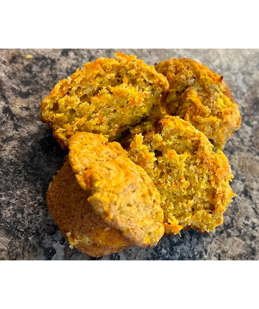 Picture of a few Whole Wheat Apple Honey Carrot Muffins