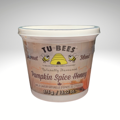 A 375g tub of Tu-Bees Pumpkin Spice flavoured honey, OU Kosher, Product of Canada, with a white background